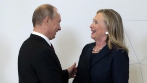 Russian President Vladimir Putin (L) welcomes US Secretary of State Hillary Clinton during the Asia-Pacific Economic Cooperation (APEC) Summit in Russia's far eastern port city Vladivostok on September 8, 2012. Australian AFP PHOTO / POOL (Photo credit should read MIKHAIL METZEL/AFP/GettyImages)